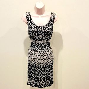 Sleeveless black and white print knee length dress